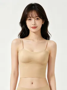 Close-up of seamless skin-tone camisole bra with thin straps and smooth fabric texture