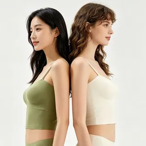 Detail view of seamless olive green and cream white padded bralette with thin straps
