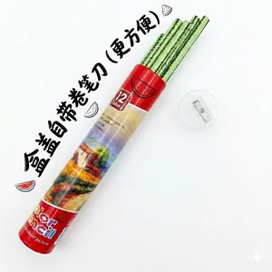 Close-up of 12 rainbow paper pencils with watermelon patterns and a sharpener lid