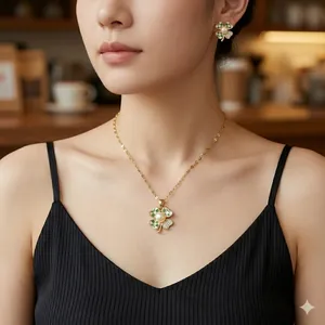 Titanium steel jewelry set with clover pendant, pearl details and checkered zircon stones