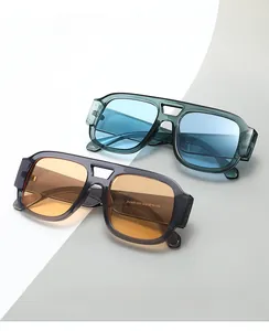 Detail view of double bridge sunglasses showing model ZN3935 54-19-145 on the lens