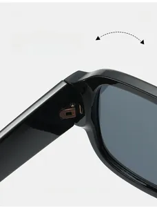 Macro detail of high durability metal hinge on black oversized fashion sunglasses