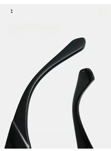 Detail of curved temples on black sunglasses for comfortable wear and ergonomic fit