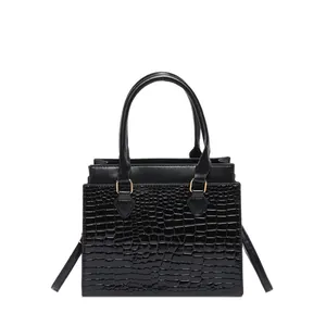Elegant black croc-embossed tote bag with smooth leather splicing and gold hardware details