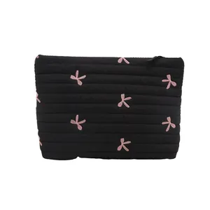 Gesteppte schwarze Kosmetiktasche mit rosa Schleifenstickerei und Reißverschluss