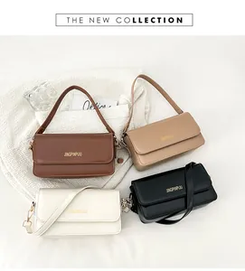 Flat lay of vintage rectangular flap bags in dark coffee, beige, white, and black colors