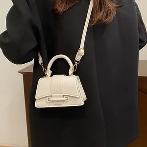 Minimalist white litchi pattern leather mini square bag with arc handle and strap