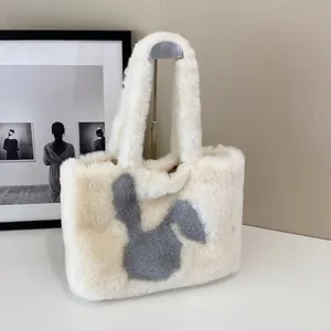 Plush beige tote bag with grey rabbit applique design and fuzzy faux fur texture