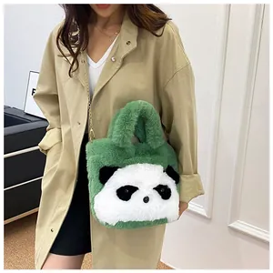 Detail of green plush panda handbag with gold chain strap on a khaki coat outfit