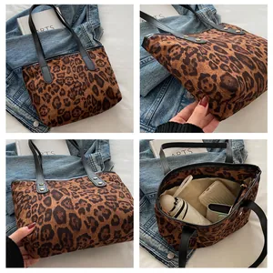 Detail view of leopard print tote bag interior showing large capacity for essentials