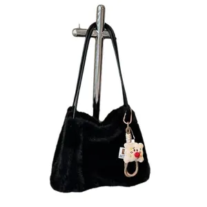 Furry black plush shoulder bag with cute teddy bear pendant and thin shoulder straps