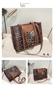 Detail view of large leopard print tote bag with brown leather handles and vintage styling