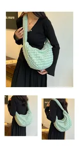 Detail of mint green plush tote bag showing its soft fluffy texture and spacious design