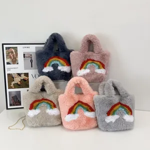 Furry tote bags with rainbow cloud patterns in various colors and gold chain straps