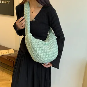 Soft mint green puffer bag with quilted texture and large capacity for women