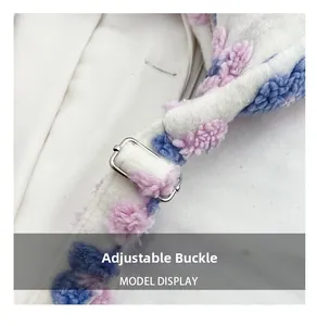Macro detail of the adjustable silver buckle on the white plush floral tote bag