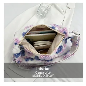 Detailed view of the spacious inner compartment of the floral plush tote bag