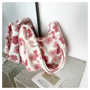 Detailed close-up of fluffy floral tote bag with soft plush texture and silver buckle