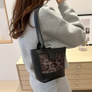 Vintage large capacity black tote bag with leopard print accent and slim shoulder straps