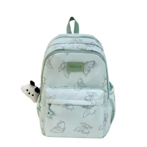 Mochila escolar verde menta con mariposas grises y lindo llavero de felpa de panda