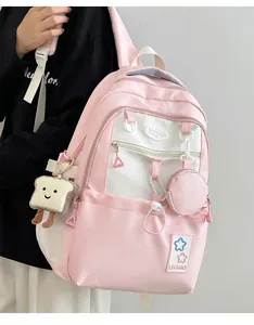 Rosa Studentenrucksack mit großem Fassungsvermögen und süßem Plüschanhänger