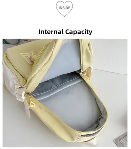 Detailansicht des geräumigen Innenfachs und Laptopfachs des gelben Rucksacks