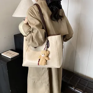 Retro large soft leather tote bag for women in cream with brown shoulder straps