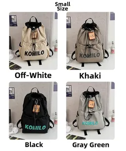 Small lightweight drawstring backpacks in four colors with cute plush keychains