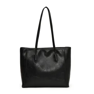 Classic large black leather tote bag for women with long shoulder straps for daily commute