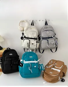 Detailed display of high-capacity nylon backpacks in five various color options