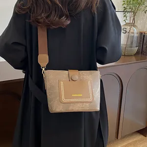 Fashion khaki shoulder bucket bag with wide strap and minimalist textured PU leather