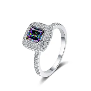 Macro view of a 925 sterling silver ring with princess cut colorful moissanite stone
