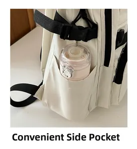Close-up of a beige backpack showing a convenient side pocket with buckle straps
