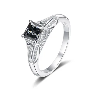 Detailed side view of S925 silver ring featuring princess cut black stone and hollow carving