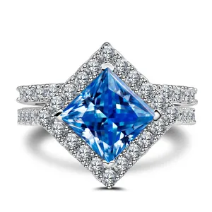 Sparkling S925 silver ring featuring a 3CT princess cut blue gemstone and double diamond band