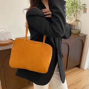 Orange rectangular matte shoulder bag for women with minimalist retro design