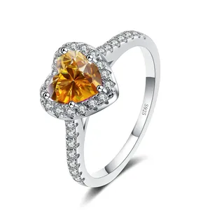 Macro detail of S925 hallmark on heart-shaped yellow moissanite halo ring band