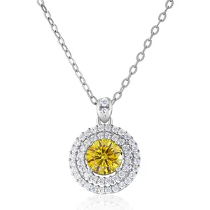 Detail of double halo pendant necklace with a brilliant round yellow gemstone in silver
