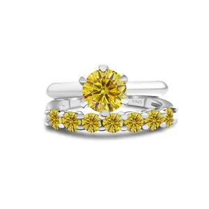 Macro shot of S925 sterling silver stamp and yellow moissanite stone on the ring set