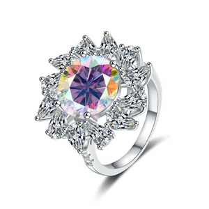 Macro shot of 925 silver ring featuring a pear-cut rainbow moissanite sunflower detail
