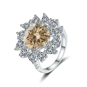 Luxurious S925 silver ring featuring a pear-cut champagne gemstone flower halo design