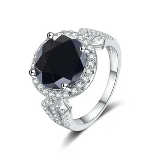 Macro detail of S925 silver ring featuring a 5-carat black moissanite stone in halo setting