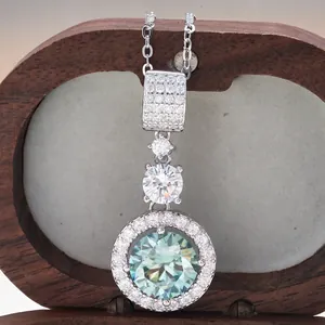Sterling silver necklace with 5ct light blue moissanite pendant and sparkling diamonds