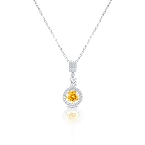 Elegant silver necklace featuring a large 5-carat yellow moissanite halo pendant