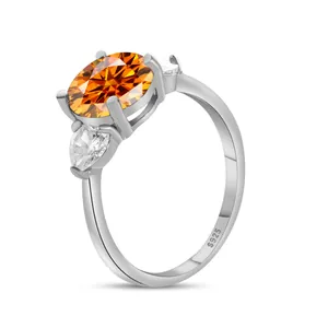 S925 sterling silver ring featuring a 3CT oval orange moissanite with side stones