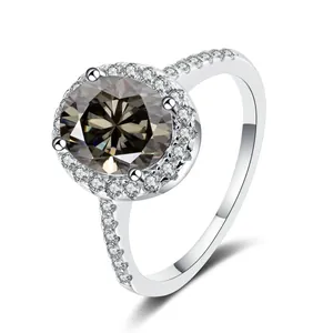 925 silver halo ring with oval moissanite and pave stones on white background