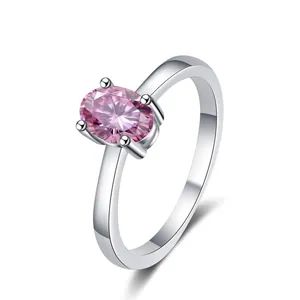 Anillo de plata 925 con una moissanita rosa de corte ovalado y engaste de cuatro garras