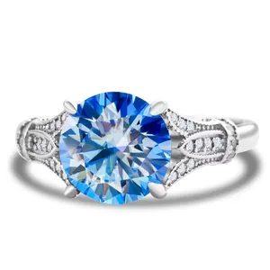 Vintage 925 sterling silver ring with 3 carat round blue moissanite and side diamonds