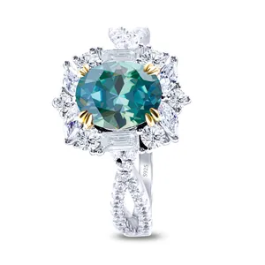 Luxury S925 silver ring featuring a large oval blue-green gemstone with floral halo