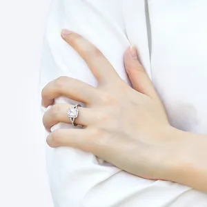 925 silver ring featuring square zircon main stone and halo pave setting on model